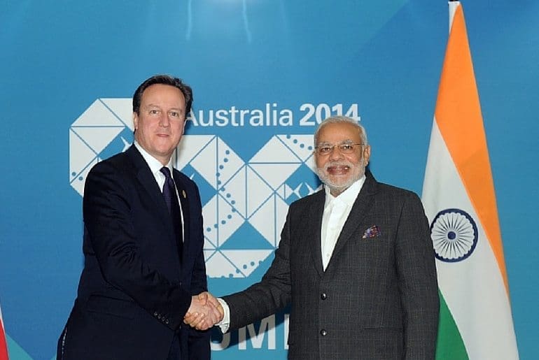 Modi and Cameron shake hands at the G20 summit in 2014
