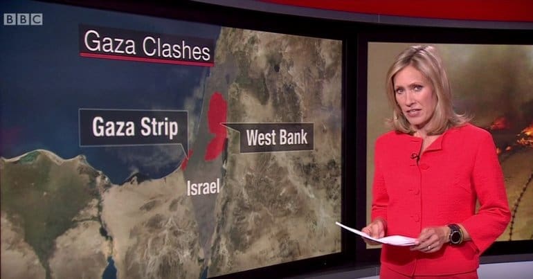 Image of a BBC news reporter reporting on 'Gaza clashes'