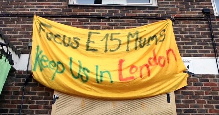 A Focus E15 sign calling on mums to be kept in London
