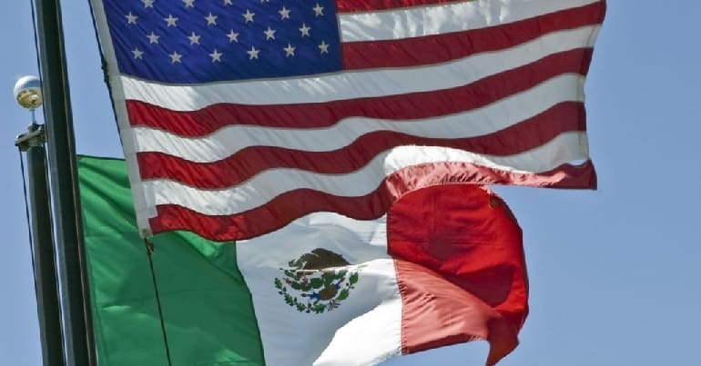 US and Mexican flags next to each other