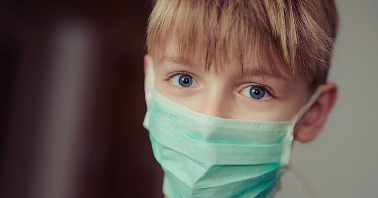 A boy wearing a face mask coronavirus