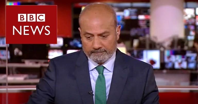 George Alagiah and the BBC News logo