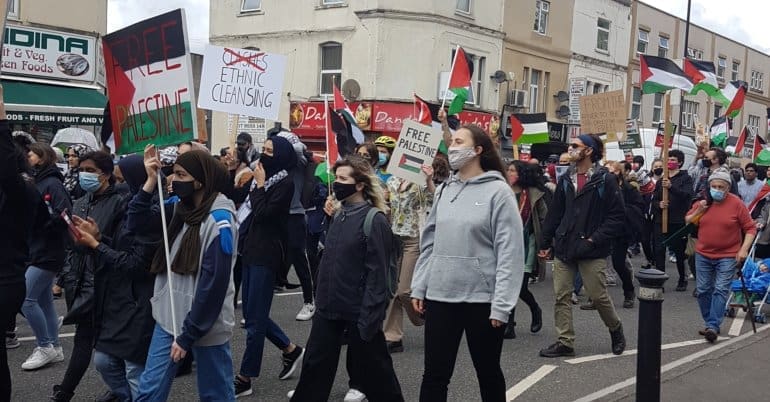 people on a free Palestine march