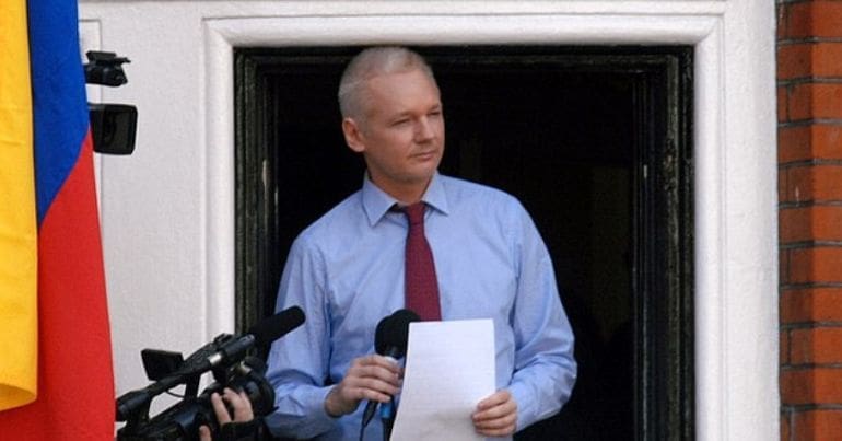 Julian Assange gives a speech from the Embassy