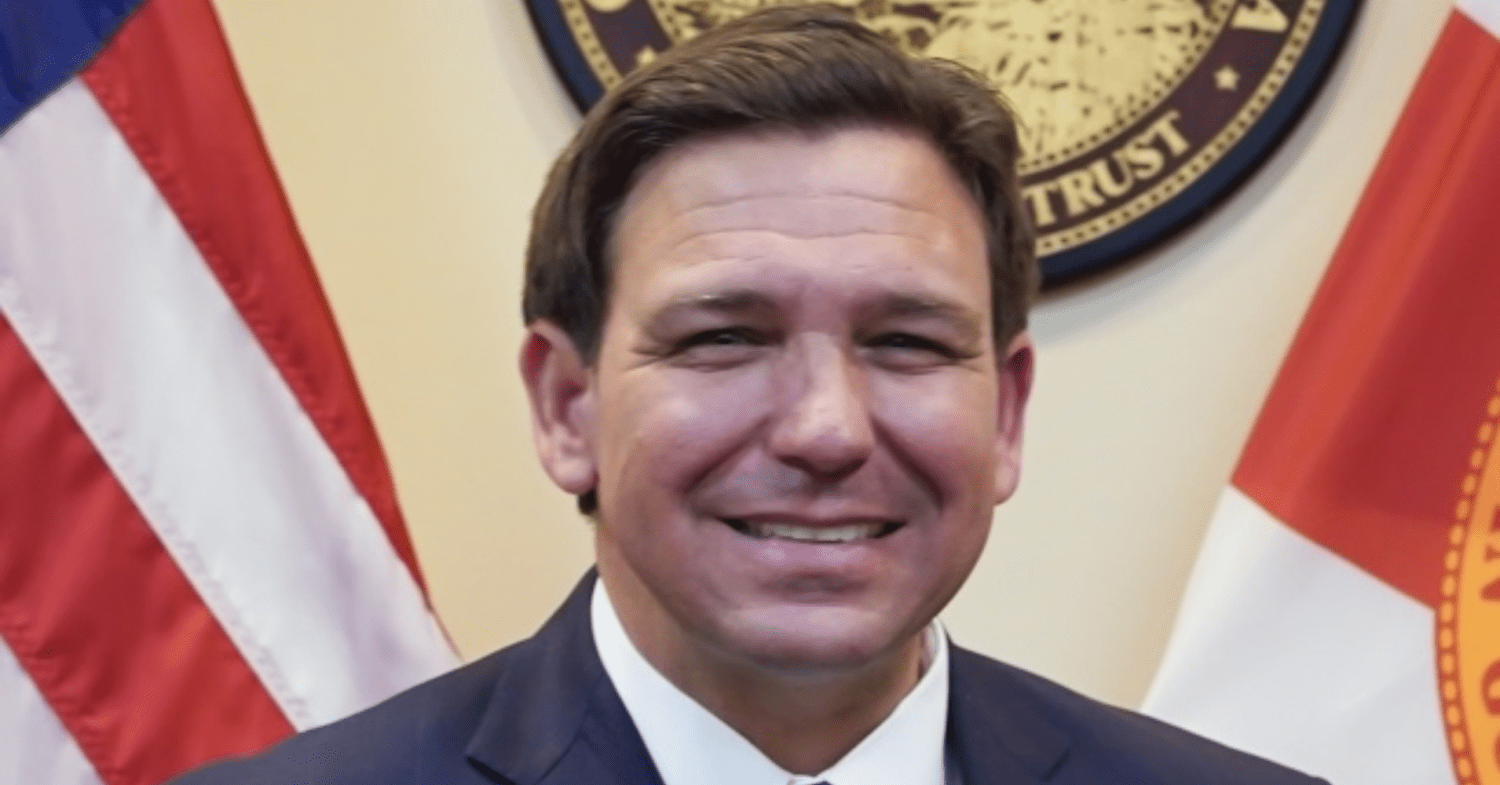 DeSantis poses with flags