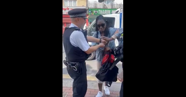 Cops arresting a Black woman in Croydon over a bus fare