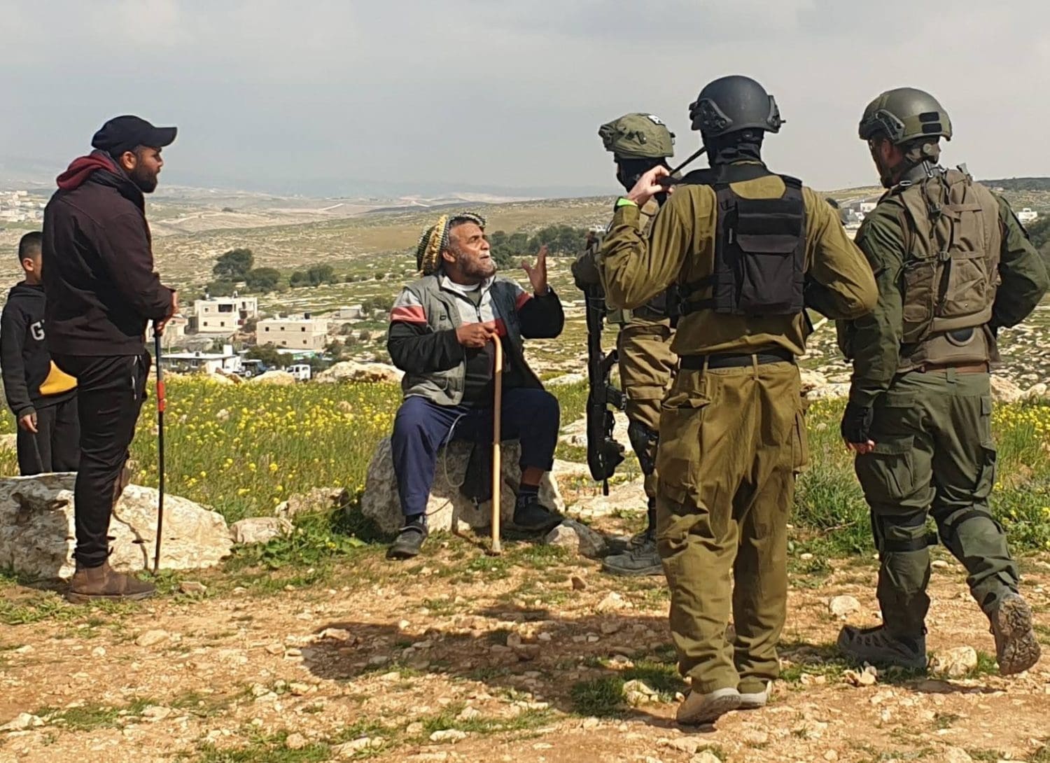 A shepherd being harassed by IDF soldiers in the West Bank
