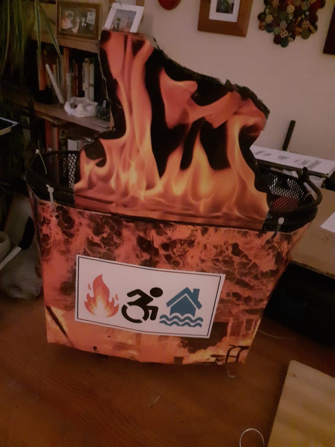 A wheelchair covered in pretend flames