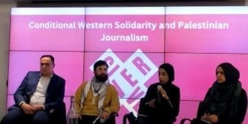 Panelists speak at the Give Over event in London on "Conditional Western Solidarity and Palestinian Journalism".