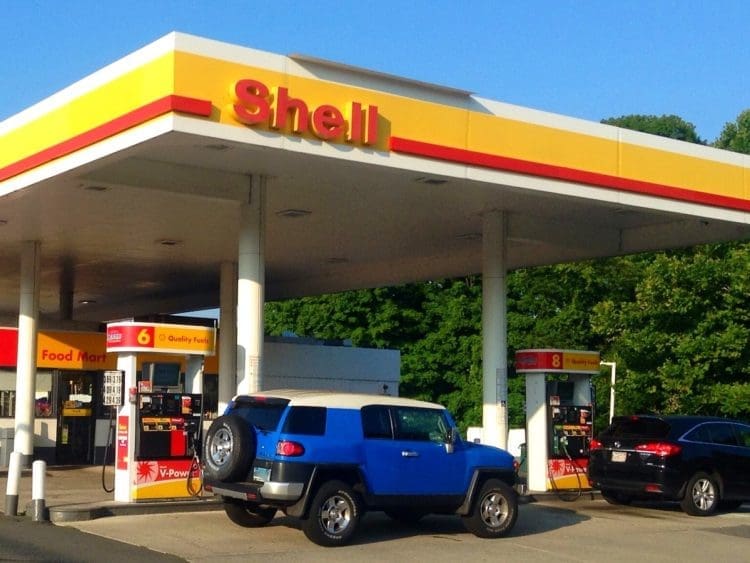Shell petrol station with cars using it